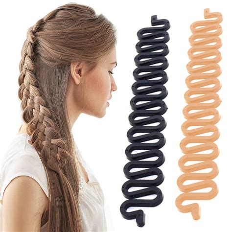 Grab three small pieces (about half an inch or less) at your hairline. . French braid tool